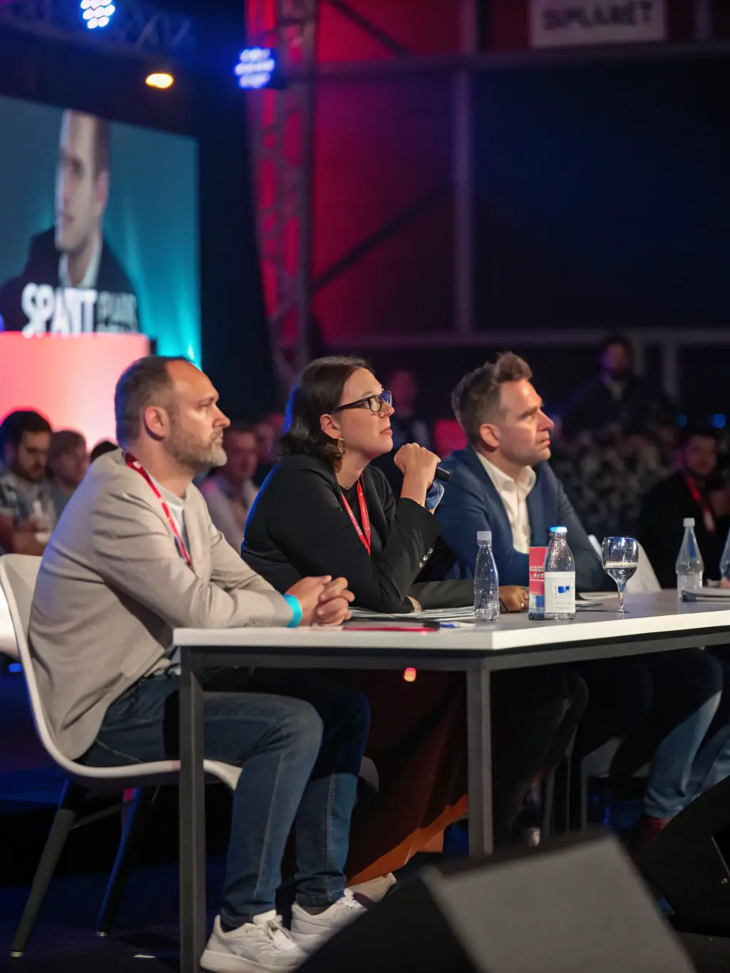 A photograph capturing the energy of a startup pitch competition, with entrepreneurs presenting their innovative ideas to a panel of judges at a past Outrunway event.